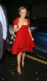Hayden Panettiere in red dress shows nice cleavage and almost show upskirt as she gets out of car at Cipriani Restaurant in London