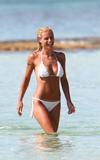 Michelle Hunziker in bikini spend holidays on Formentera Island