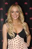 Lindsay Lohan shows nice cleavage at Fornarina Party at the Carrousel du Louvre in Paris