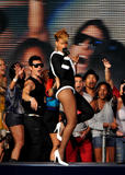 th_59551_celebrity-paradise.com-The_Elder-Rihanna_2010-02-04_-_Pepsi_Super_Bowl_Fan_Jam_in_Miami_3240_122_404lo.jpg