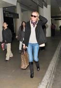 th_31788_Preppie_Diane_Kruger_arriving_into_LAX_Aiport_8_123_425lo.jpg
