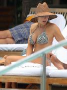 Brittany Daniel - wearing a bikini at a pool in Miami 04/22/13