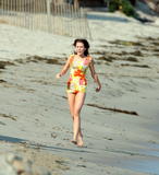 Miley Cyrus filming Hannah Montana on the beach in Malibu