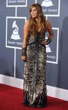 http://img226.imagevenue.com/loc571/th_52162_MileyCyrus_53rdGrammyAwards_130211_001_122_571lo.jpg